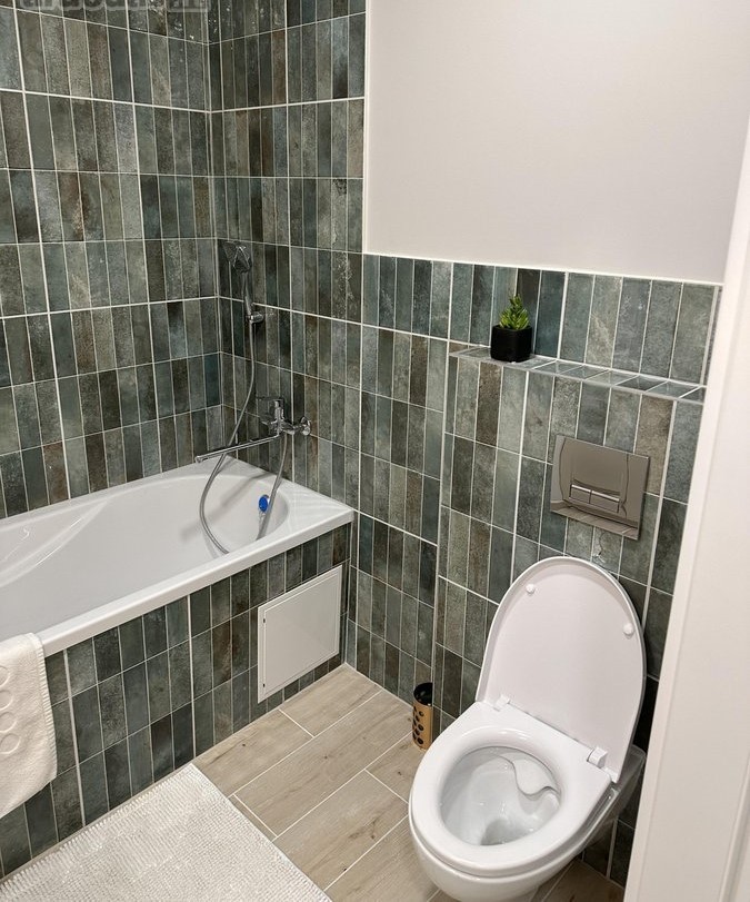Suremontuotas butas, Sportininkų gatvėje