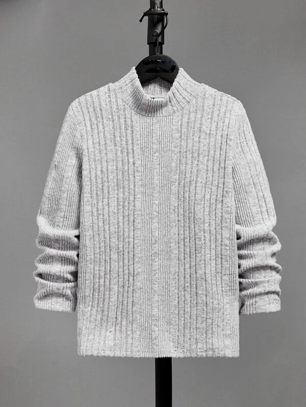 Pilkas megztas golfas