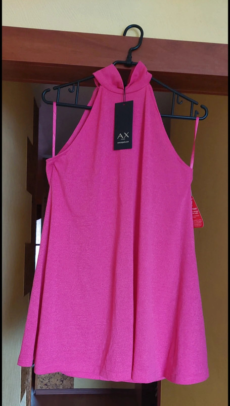 Rožinė megzta suknelė