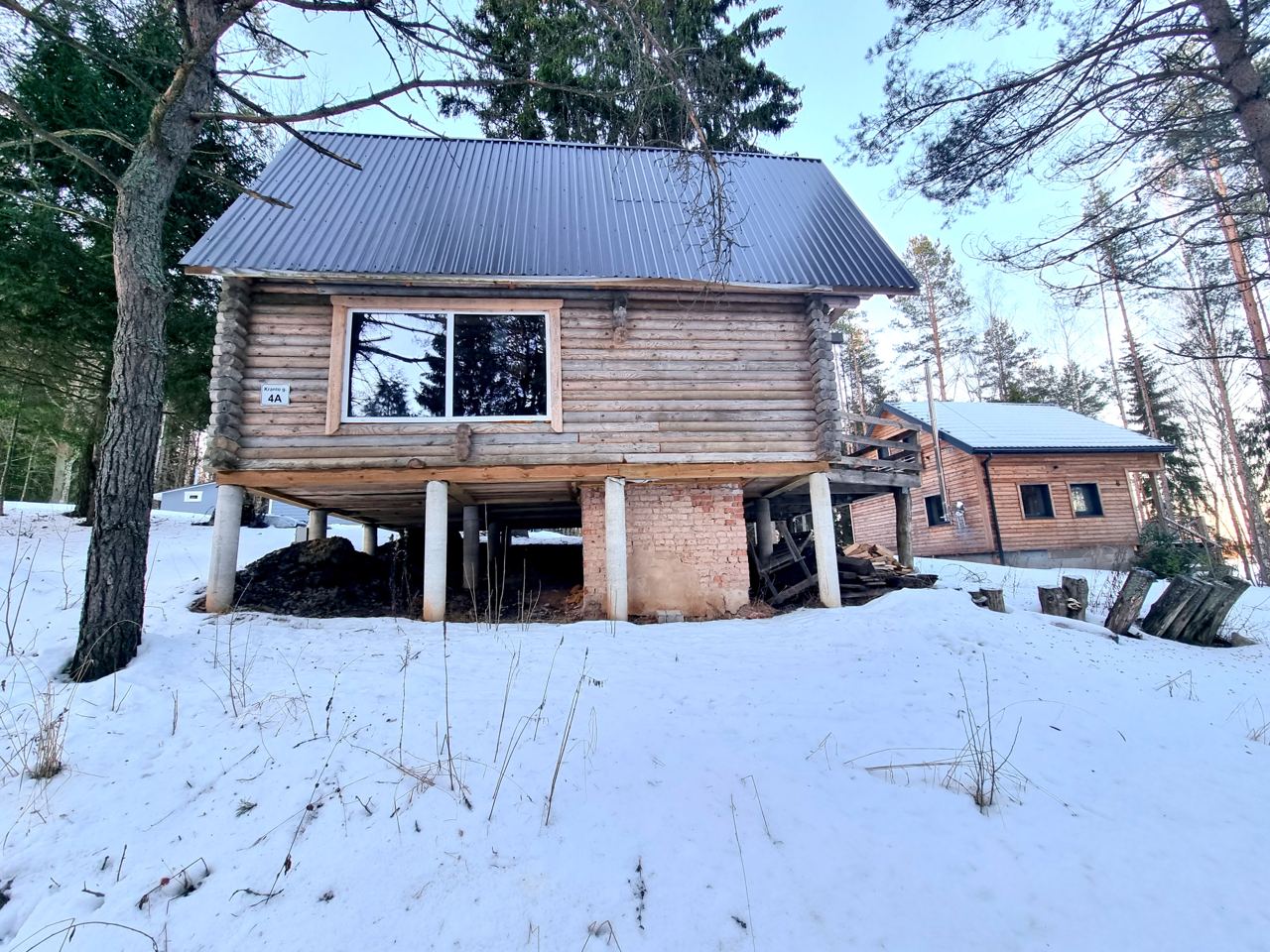 Išskirtinis sklypas su poilsio namu