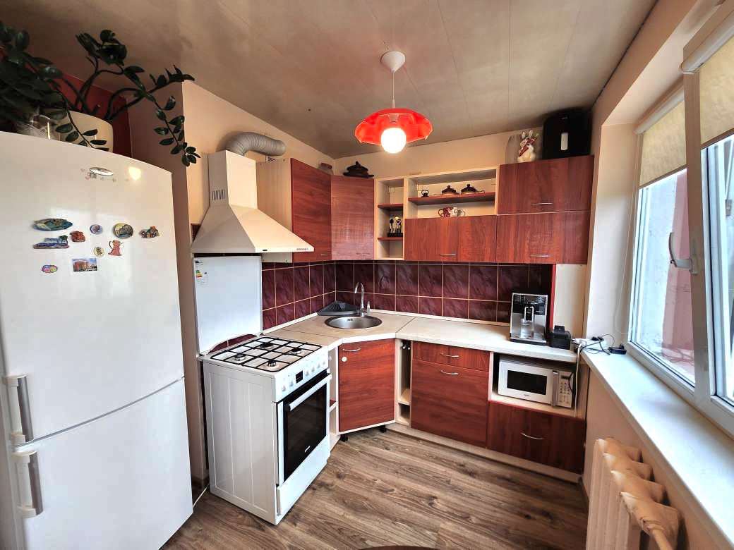 4 kambarių butas Renovuotame name