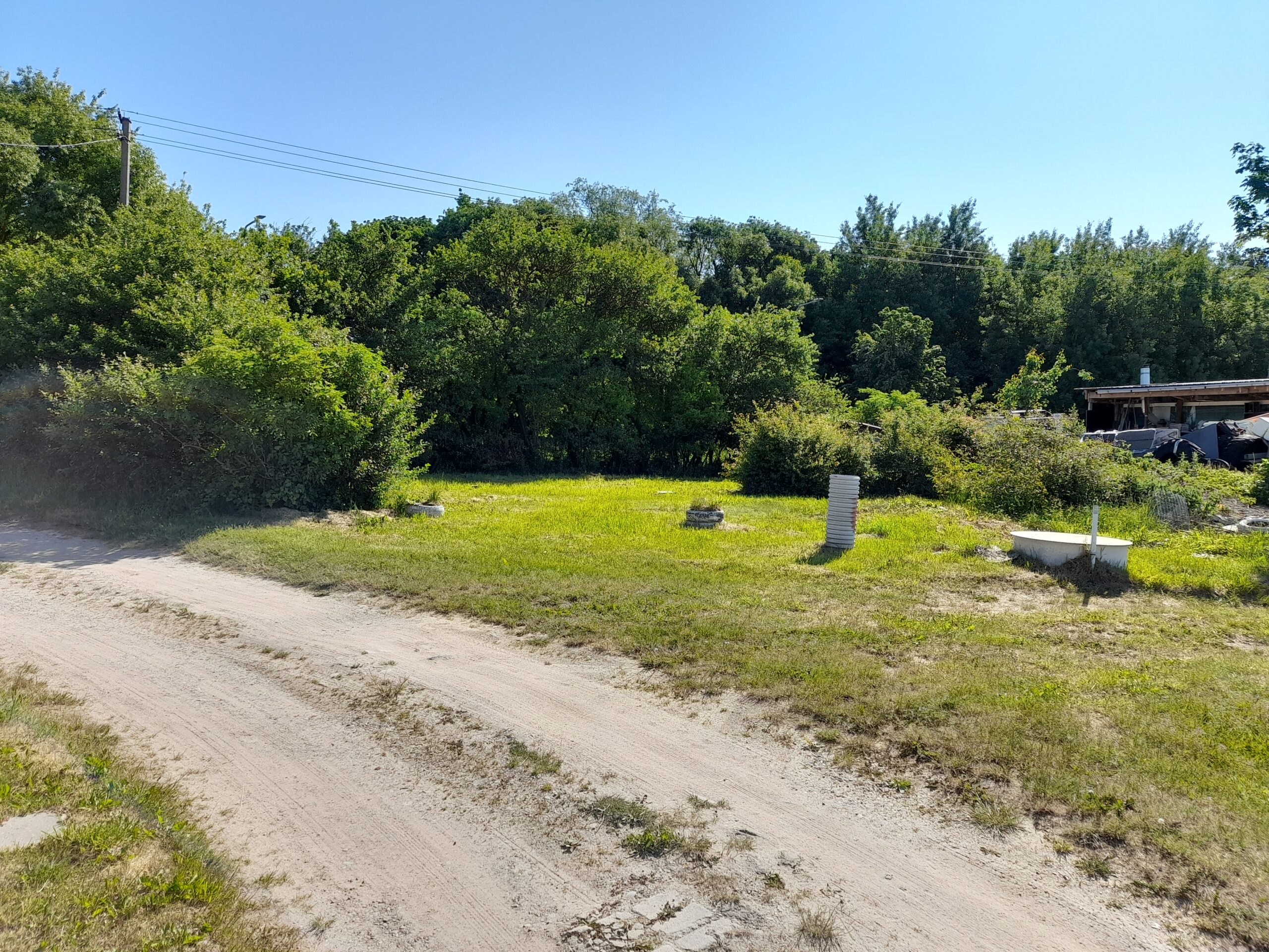 Parduodamas sklypas su namo dalimi Tauralaukyje