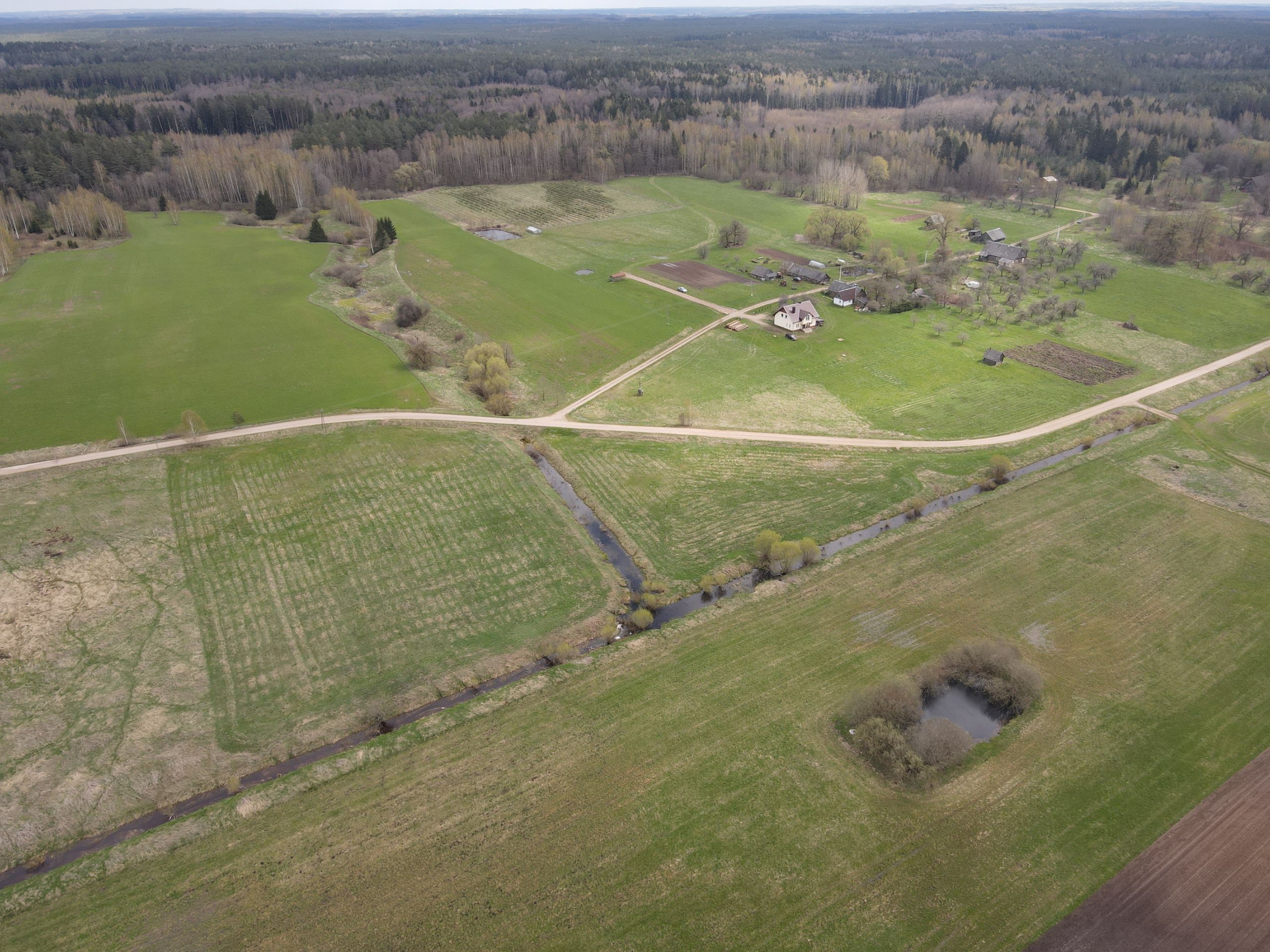 1,5704 HA ŽEMĖS SKLYPAS ŠIRVINTŲ R. SAV., JAUNIŪNŲ SEN., DRAUČIŲ k.