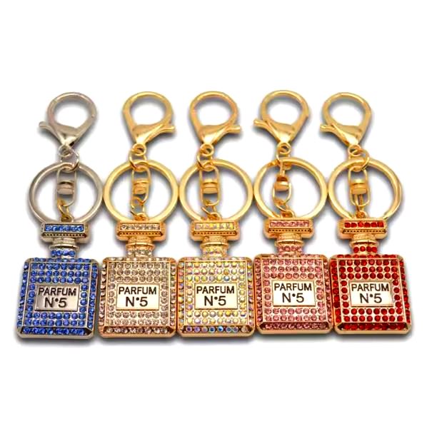 Prabangiai atrodantis raktų pakabukas „kvepalų buteliukas”