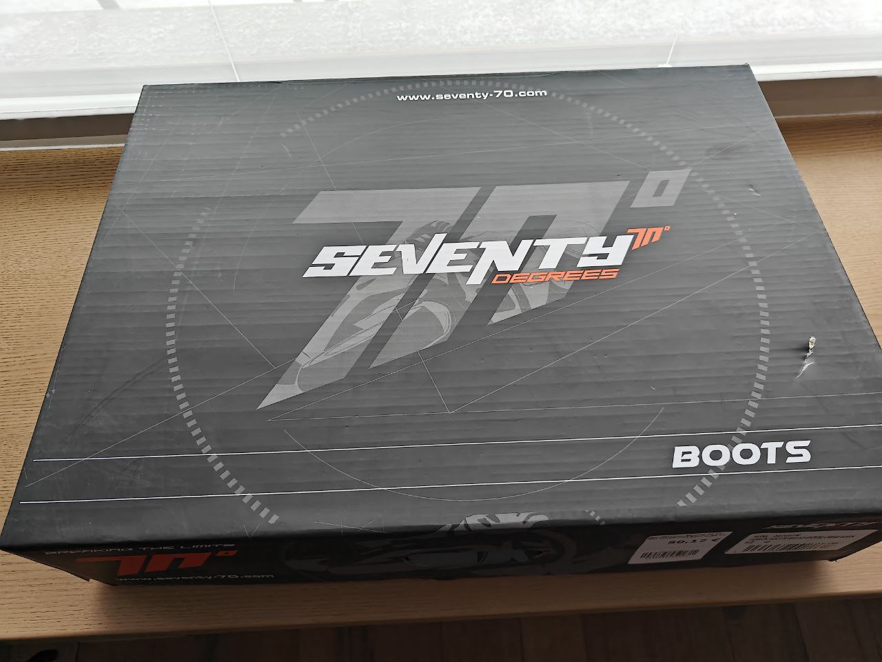 Seventy aukšti motociklisto batai